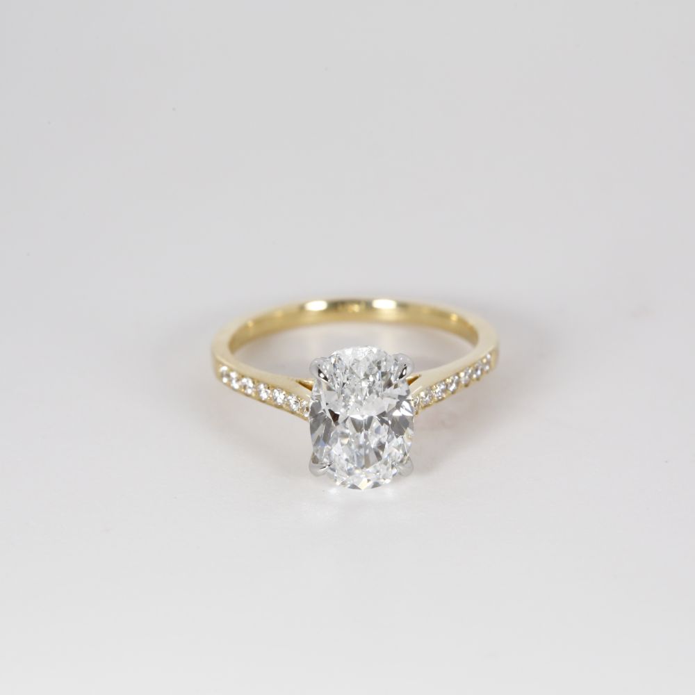 Yellow Gold Shoulder Set Oval Cut Engagement Ring 360° view